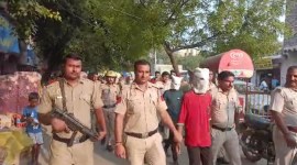 murder case, Delhi Police, murderer parade in locality, Delhi police escort, Central Delhi’s Ranjit Nagar, viral video, indian express, indian express news