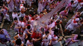 the Wider Image: A century on, Hemingway's prose lures revellers to Spain's Pamplona