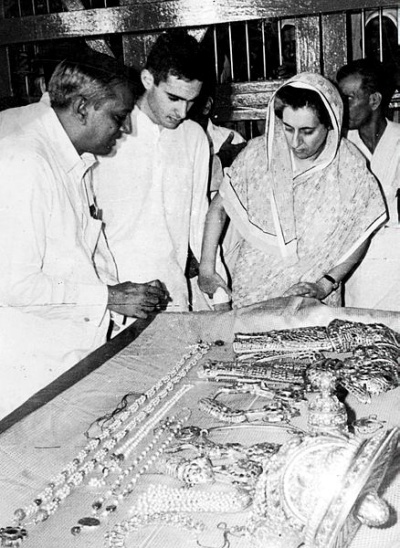 Indira Gandhi and Sanjay Gandhi looking at Lord Venkateshwara's jewels at Tirupati. Express archive photo