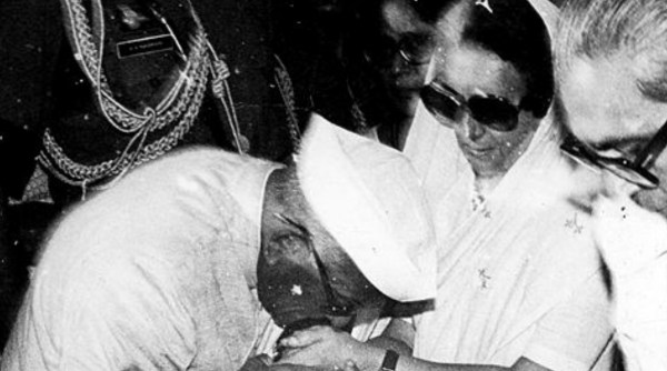 President Neelam Sanjiva Reddy consoling Indira Gandhi after Sanjay Gandhi's death. Express archive photo
