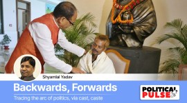 Madhya Pradesh Chief Minister Shivraj Singh Chouhan presents a shawl to Dashmat Rawat, the Sidhi urination case victim. (PTI)