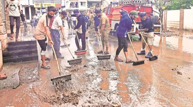 Navsari flood, Gujarat cloudburst, Gujarat cloudburst death toll, schools remain closed, District Education Officer direction to school, indian express, indian express news