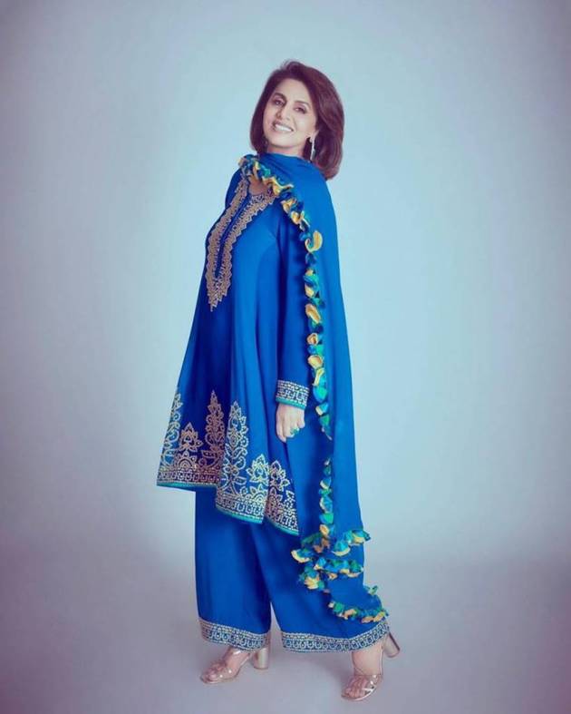 The veteran actor prefers to let her bright outfits do the talking and keeps her makeup natural looking. (Pic source: Instagram/Neetu Kapoor)