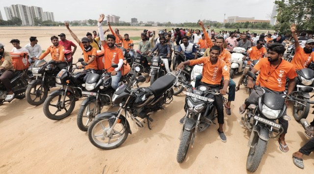 Ahmedabad Swiggy delivery protest, Swiggy delivery partners protest, swiggy protest at GMDC Ground, Swiggy Riders Association protest, Swiggy Riders Association, indian express, indian express news