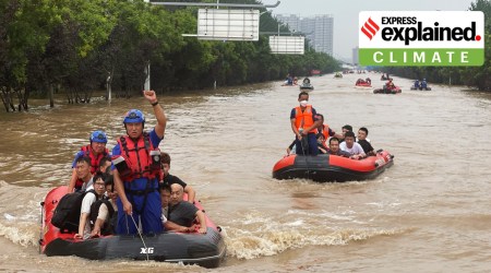 Residents are evacuated by rubber boats through in northern China's Hebei province, south of Beijing, Wednesday, Aug. 2, 2023. China's capital has recorded its heaviest rainfall in at least 140 years over the past few days.