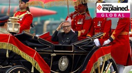 Pakistan President Arif Alvi arrives in a horse-drawn carriage to attend the Pakistan Day military parade in Islamabad
