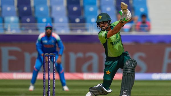 Babar Azam plays a shot against India.