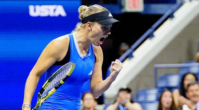 Caroline Wozniacki reacts during a match against Petra Kvitova.