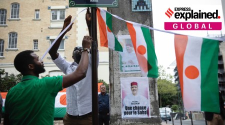 Demonstrators gather in front of the Embassy of Niger in Paris, in support of Nigerien President Mohamed Bazoum and ECOWAS, Saturday, Aug. 5, 2023.