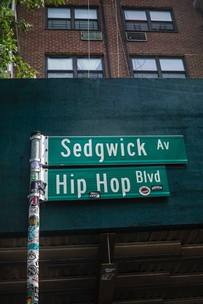 A street sign at Bronx's Sedgwick Houses apartments is shown renamed as Hip Hop Blvd, recognizing the site where hip hop's creator DJ Kool Herc first held parties featuring his new sound, July 26, 2023, in New York.