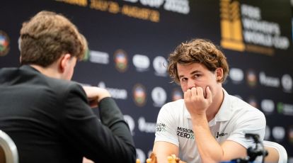 20 July 2019, Baden-Wuerttemberg, Karlsruhe: The 14-year-old Vincent Keymer  (r) plays at the chess tournament Grenke Open against world champion Magnus  Carlsen and is defeated only after the 81st move after 6:45