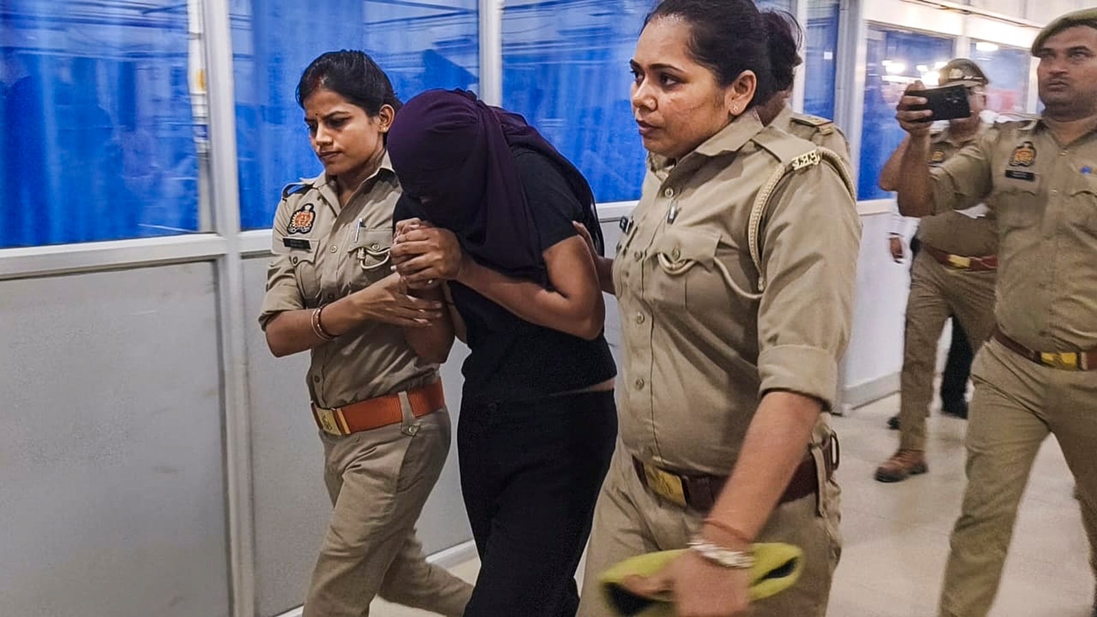 Indore man's murder: Sonam Raghuvanshi, the Indore woman accused of plotting her husband's murder, being brought for medical examination at a hospital in Ghazipur on Monday