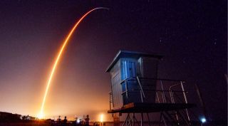 A SpaceX rocket taking off from cape canaveral