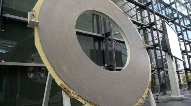 A view shows one of the superconductor coils which are assembled to form the giant magnet within which the magnectic field is 11.7 T.