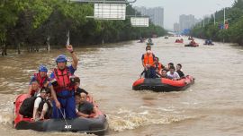 Thousands evacuated in Beijing and nearby cities due to record rainfall from Typhoon Doksuri remnants; severe flooding and infrastructure damage.
