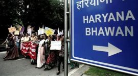 Woman protesters gathered outside Haryana Bhawan, voising concerns over bureaucratic expenses and misuse of funds.