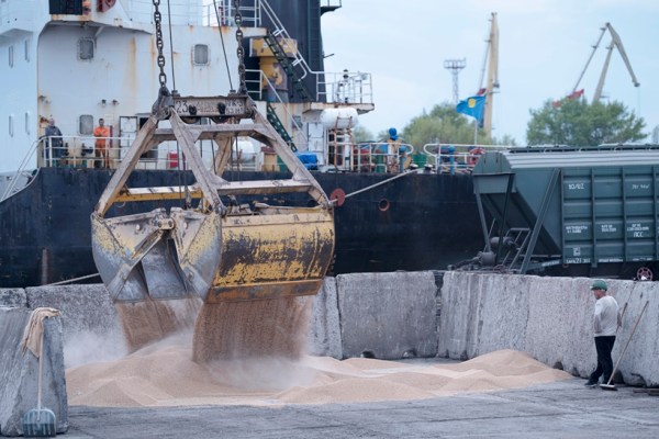 Workers load grain at a grain port in Izmail, Ukraine, on April 26, 2023. NATO said Wednesday July 26, 2023, it was stepping up surveillance of the Black Sea region as it condemned Russia’s exit from a landmark deal that allowed Ukrainian grain exports through the Black Sea. (AP Photo/Andrew Kravchenko, File)