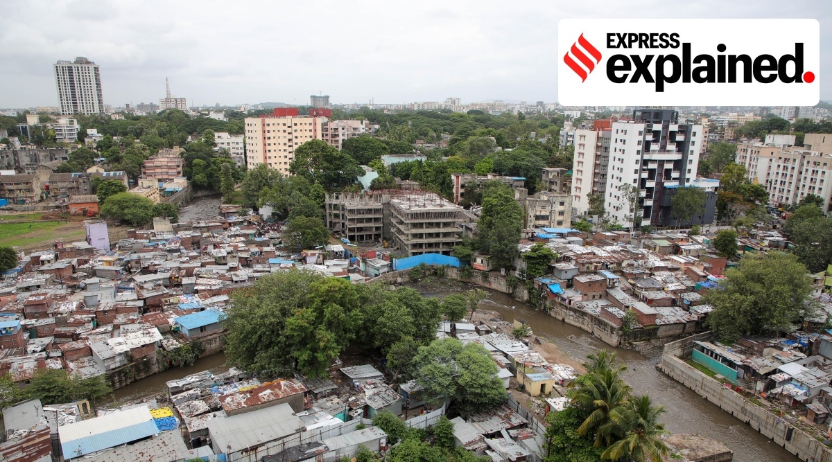 Slums alongside residential apartments in Pune.