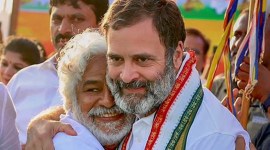 Congress leader Rahul Gandhi with Telangana folk singer Gummadi Vittal Rao. Rao who was popularly known as 'Gaddar' died at the age of 77. (Source: PTI Photo)