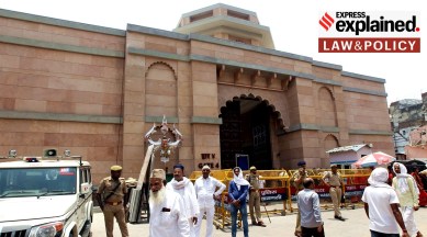 Muslim devotees arrive to offer Friday prayers amid security, at Gyanvapi Masjid in Varanasi, Friday, May 27, 2022.