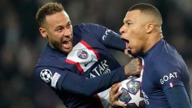 PSG's Neymar (left) celebrates with Kylian Mbappe.