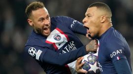 PSG's Neymar (left) celebrates with Kylian Mbappe.