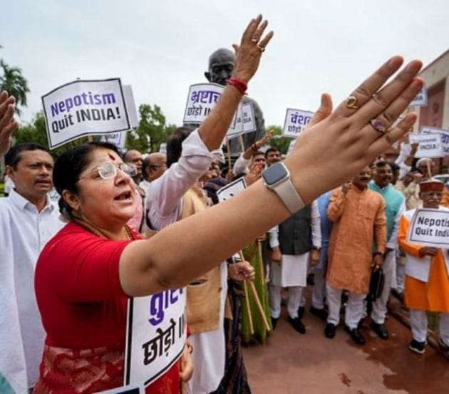 BJP MPs raise slogans during a demonstration at the Parliament House complex to mark the 'Quit India Movement Day' during Monsoon session on Wednesday. (PTI photo)