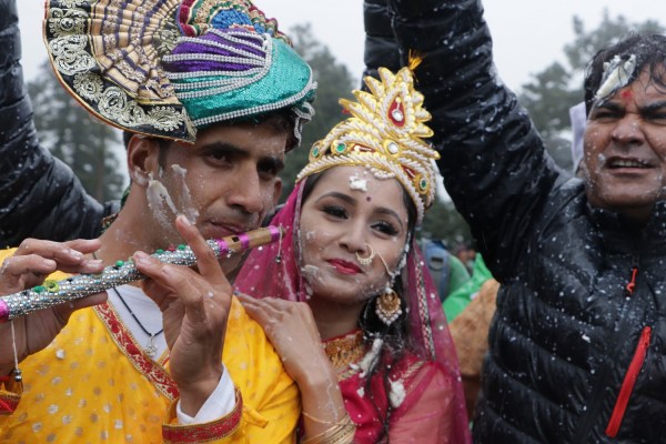 People celebrate Andhuri Holi by smearing butter and buttermilk on each other. Picture: Om_Joshi/Shutterstock