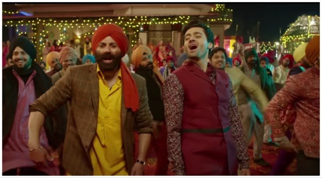 Sunny Deol and Utkarsh Sharma in a still from song "Main Nikla Gaddi Leke" from Gadar 2.
