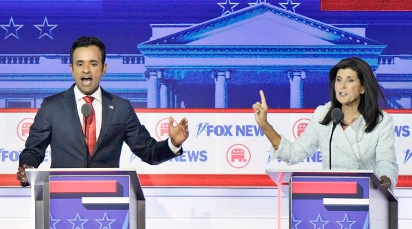 Vivek Ramaswamy and Nikki Haley speak during a Republican presidential primary debate on Aug. 23, 2023, in Milwaukee