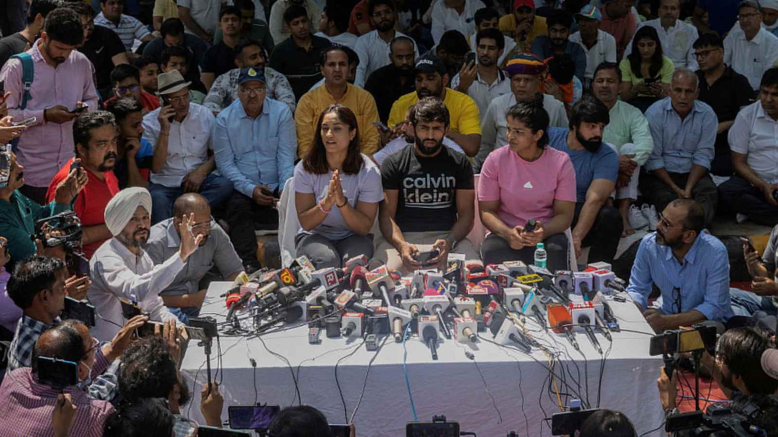 Indian wrestlers Vinesh Phogat, Bajrang Punia, and Sakshi Malik address a news conference as they take part in a sit-in protest demanding arrest of Wrestling Federation of India (WFI) chief, who they accuse of sexually harassing female players, in New Delhi, India, April 24, 2023. REUTERS/Adnan Abidi/File Photo