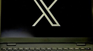 x logo featured