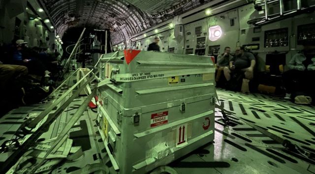 A shipping container with the canister of asteroid Bennu sample onboard a U.S. Air Force C-17 aircraft.
