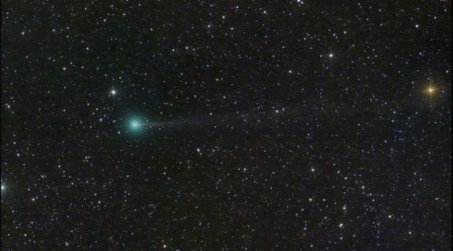 Comet Nishimura sporting a green coma and a thin tail.