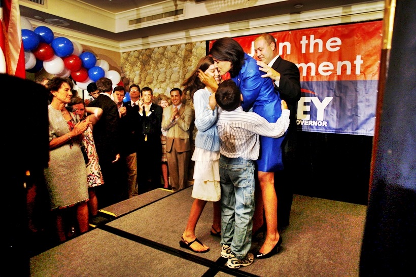 Nikki Haley celebrates with her family after winning the primary election for the South Carolina governor race at the Capital City Club in Columbia, S.C, on June 8, 2010. (Travis Dove/The New York Times)