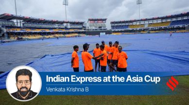 Colombo weather today: Ground staff pull down blankets as rain interrupts play of the Asia Cup cricket match between India and Pakistan in Colombo, Sri Lanka.