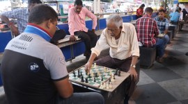 chess playing under flyover, Kolkata open-air chess club, kolkata chess news, kolkata news, Kolkata’s busy Gariahat crossing, kolkata shopping destinations, festive season, indina express news