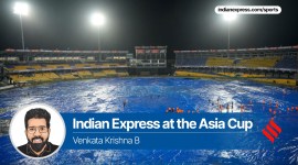 IND vs PAK Colombo Weather Report: Ground staff stand on the covered field after the rain interrupted the Asia Cup cricket match between India and Pakistan in Colombo, Sri Lanka