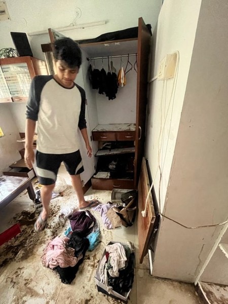 A resident showing the loss at his home after the flash floods. (Photo by Ankita Kishor Deshkar)