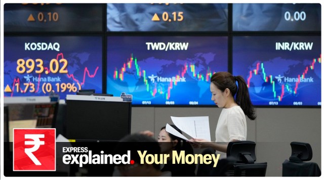 A currency trader reads documents at the foreign exchange dealing room of the KEB Hana Bank headquarters in Seoul, South Korea, Tuesday, Sept. 19, 2023. Asian shares mostly declined in cautious trading Tuesday ahead of the Federal Reserve’s looming decision on interest rates.