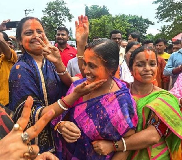 BJP workers celebrate the victory of party candidate Tafajjal Hossain in the Boxanagar assembly bypoll, at Sonamura in Sepahijala district of Tripura, (PTI photo)