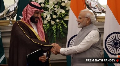 Prime Minister Narendra Modi with Saudi Arabia's Crown Prince and Prime Minister Mohammed bin Salman bin Abdulaziz Al Saud during sign key agreements after a meeting at the Hyderabad House, in New Delhi on Monday. (Express Photo by Prem Nath Pandey)