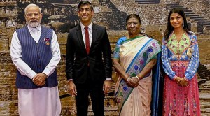 Akshata Murty poses with her husband, PM Modi and the president of India at the G20 summit dinner. (PTI photo)
