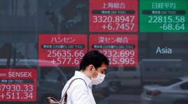 Asian shares mostly declined in cautious trading on Tuesday ahead of the Federal Reserve's looming decision on interest rates.