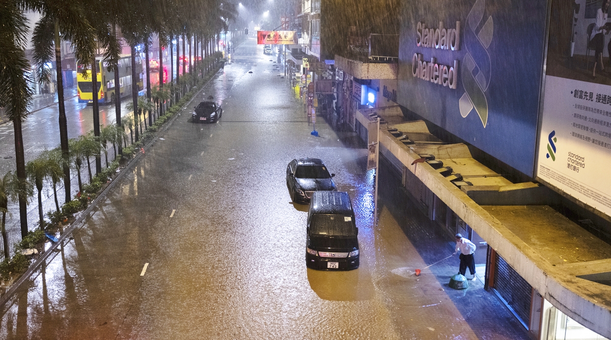 Hong Kong’s heaviest rain in at least 140 years floods city streets ...