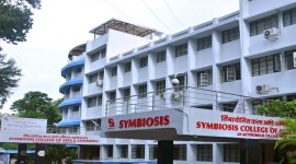 symbiosis Symbiosis teacher arrest, Pune’s Symbiosis dead-set, Hindi teacher, hurting religious sentiments, phone usage in class, indian express news