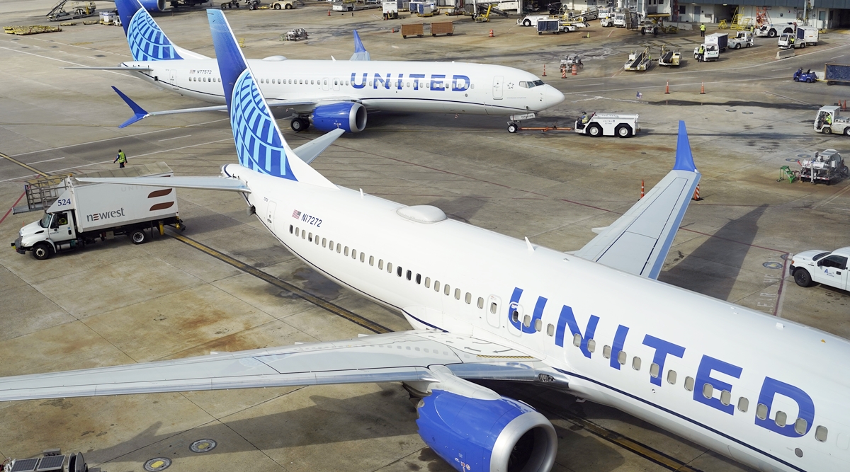 A United Airlines plane is pushed from the gate at George Bush Intercontinental Airport in Houston