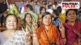 Women MPs, including Riti Pathak, show victory sign after Lok Sabha passed the motion concerning the Women's Reservation Bill during the Special Session, at the Parliament in New Delhi