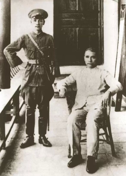 Sun Yat Sen is seated near his protege, Chinag Kai Shek. 