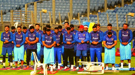 Afghanistan team offering namaaz during the practice session at Gahunje stadium on Thursday ahead of Afghanistan Vs Srilanka on 30th October. Express photograph by Rajesh Stephan